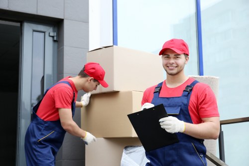 Local home moving service planning in Highbury with packed boxes and furniture