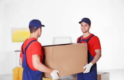 Packed boxes and moving supplies prepared for a Highbury move