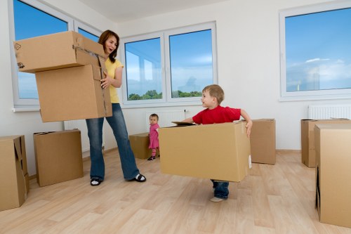 Packed household boxes ready for a move in Highbury apartment building