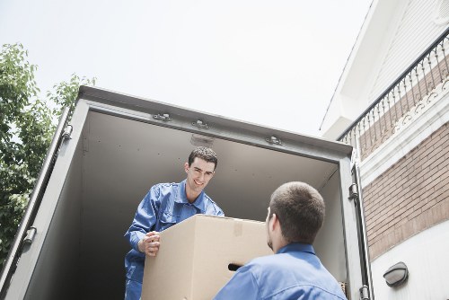 Careful wrapping of fragile household items during packing service