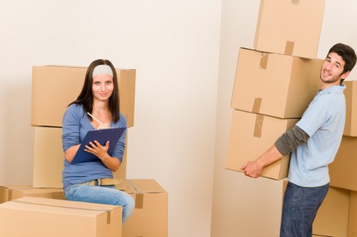 Professional removal team handling household items for a Highbury property move