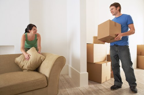 Removal van and organised belongings prepared for transport